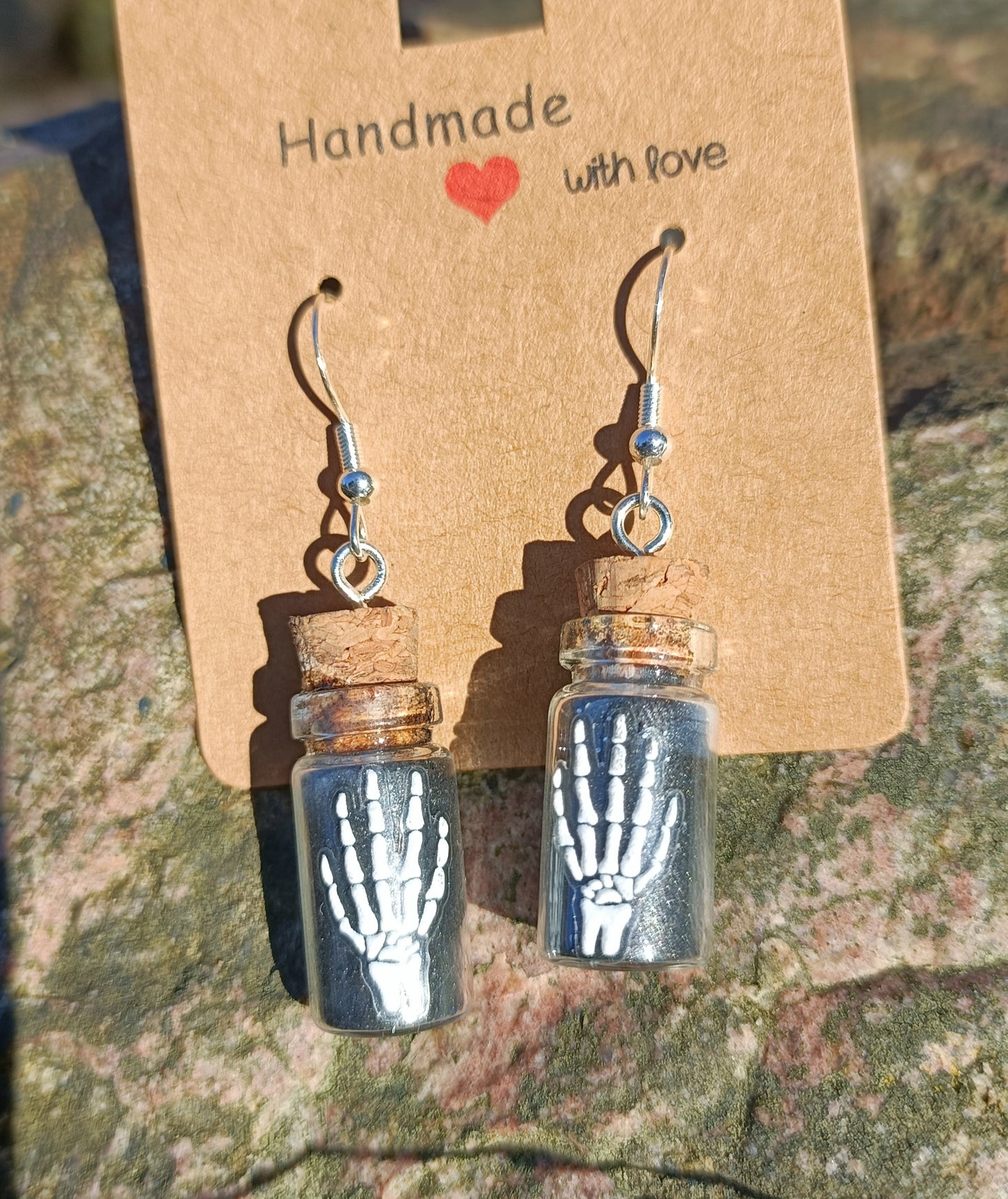 Skeletal Hand & Bottle Earrings