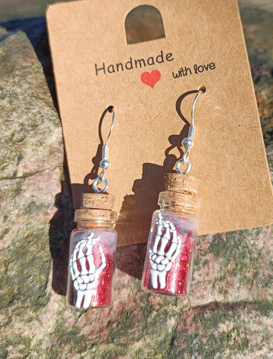 Skeletal Hand & Bottle Earrings