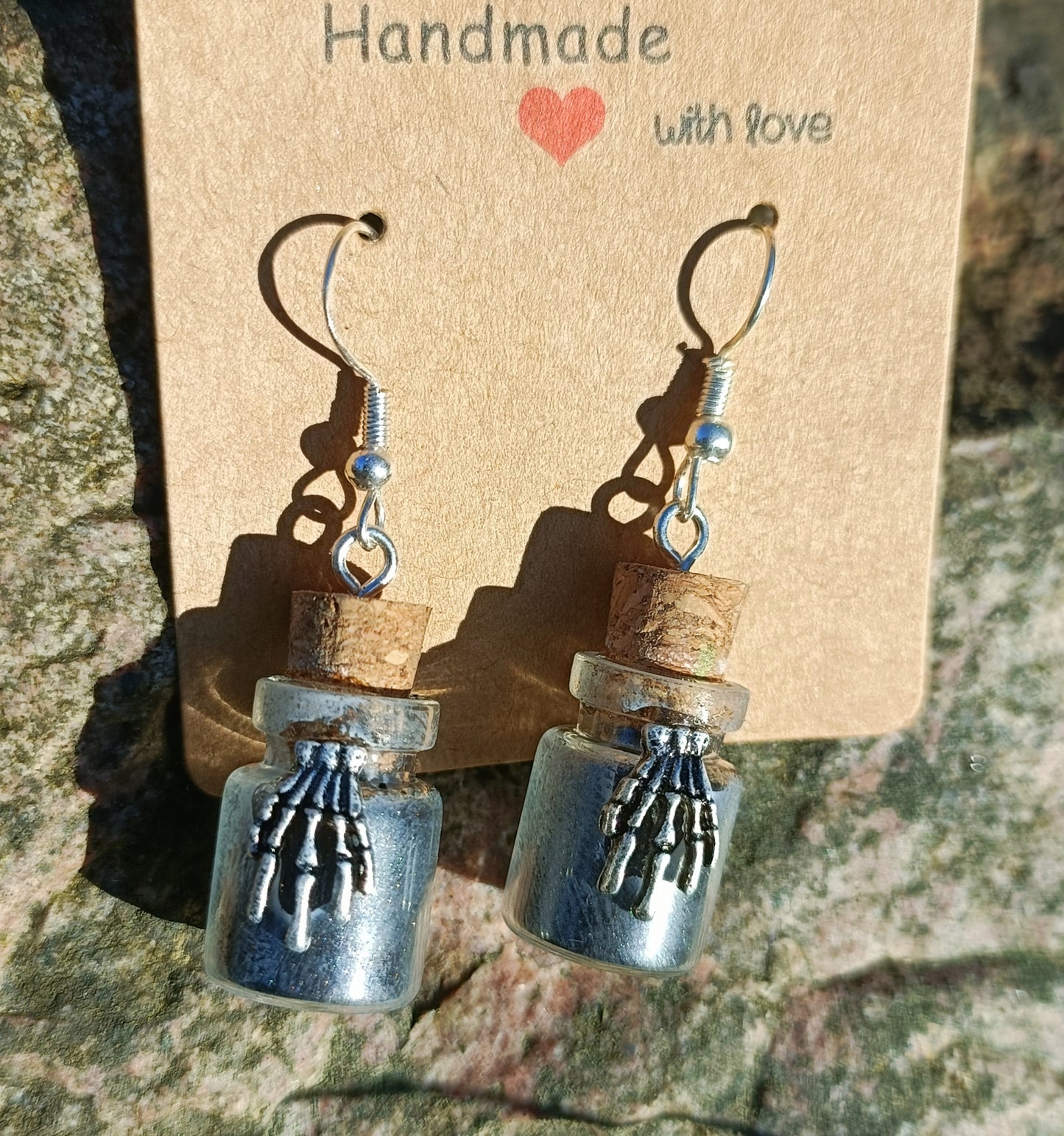 Skeletal Hand & Bottle Earrings