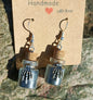 Skeletal Hand & Bottle Earrings
