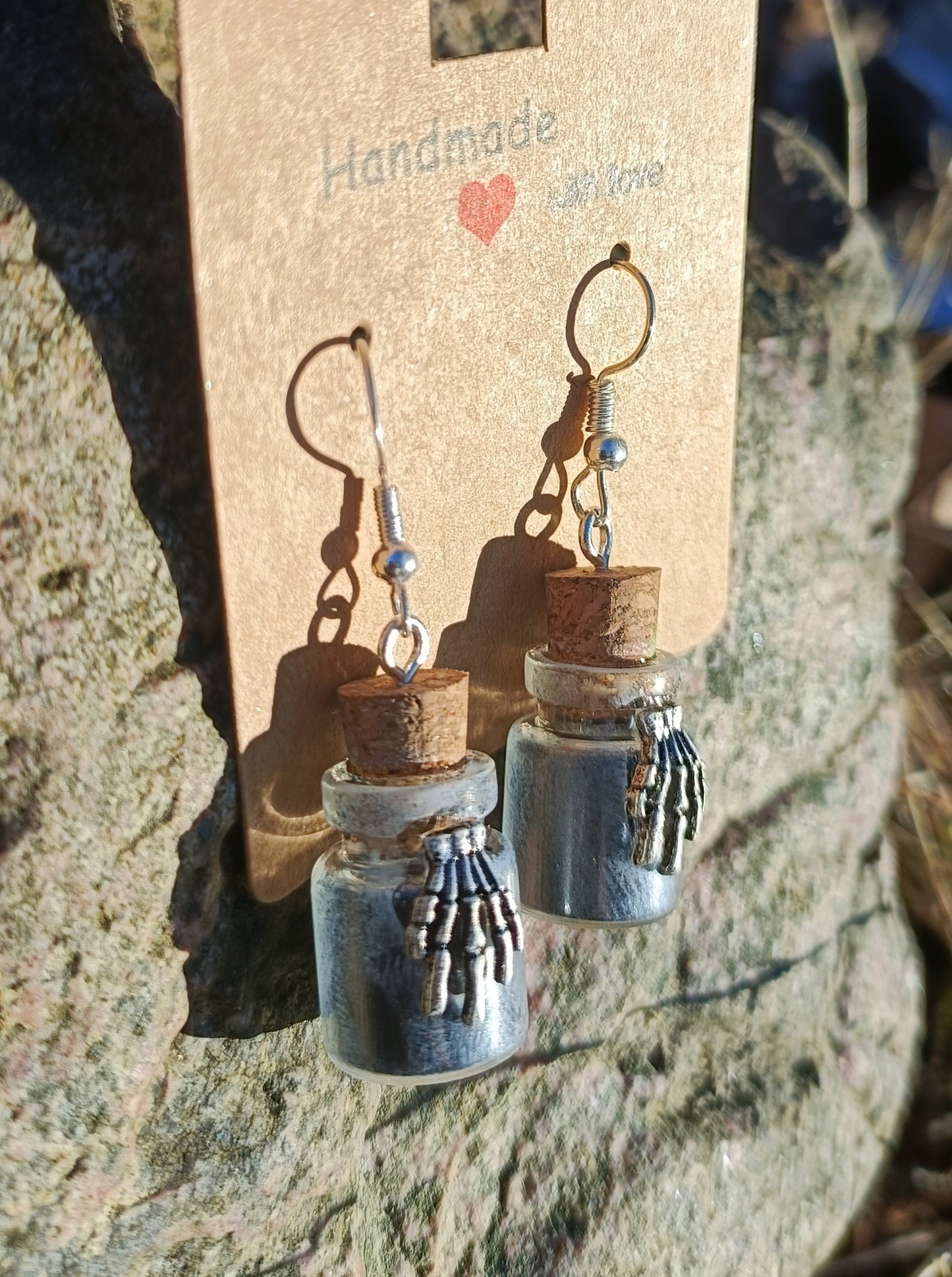 Skeletal Hand & Bottle Earrings