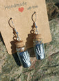 Skeletal Hand & Bottle Earrings