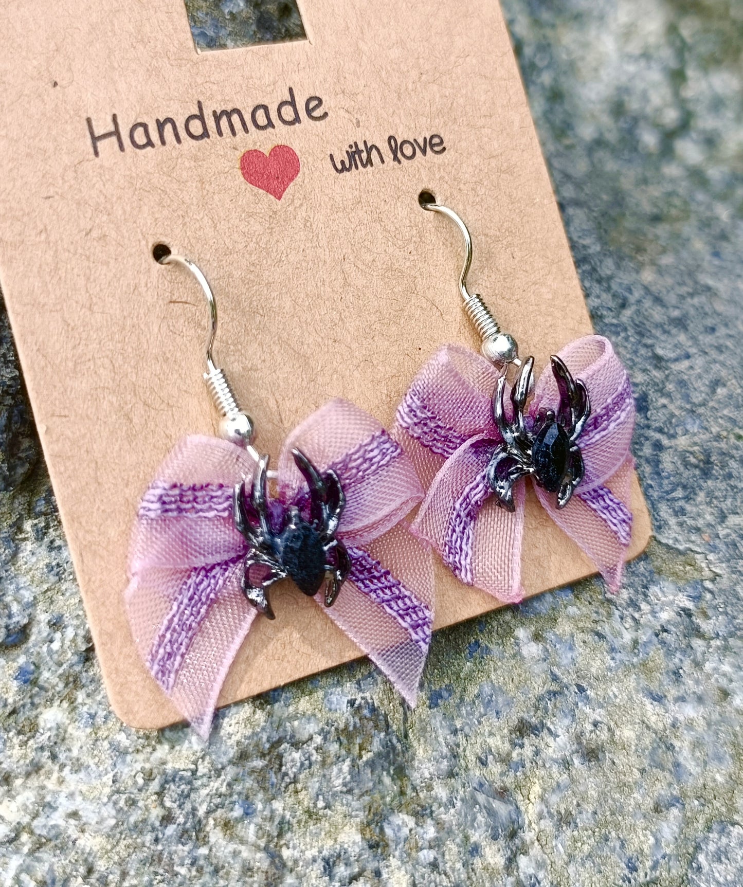 Violet spider bow earrings